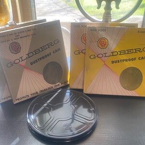 5 Goldberg Dustproof 8mm Films & Tapes with Black Metal Lids comes w/boxes
